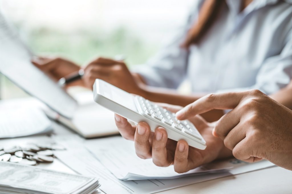 person using calculator